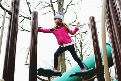 Low angle view of girl in playground