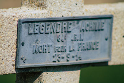 Close-up of text on wall