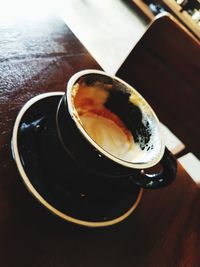 Close-up of coffee cup on table