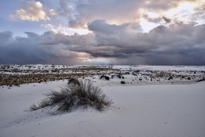 Scenic view of sea against sky during winter