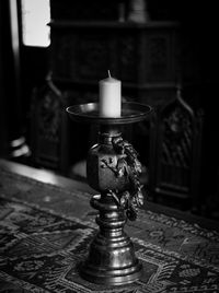 Close-up of candle on table