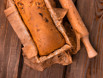 High angle view of a bread on cutting board