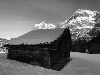 Scenic view of snow covered mountain against sky