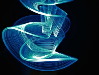 Light painting against black background