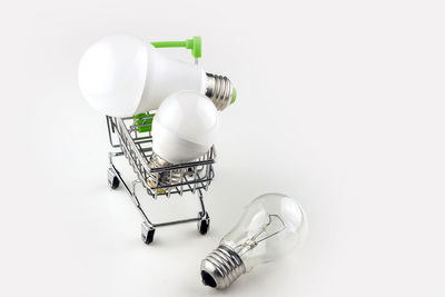 High angle view of light bulb on white background