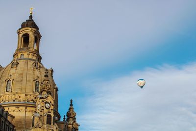 Low angle view of hot air balloons against sky