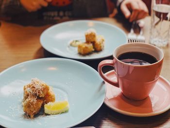 Close-up of breakfast served on table