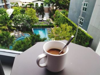 Close-up of coffee cup on table