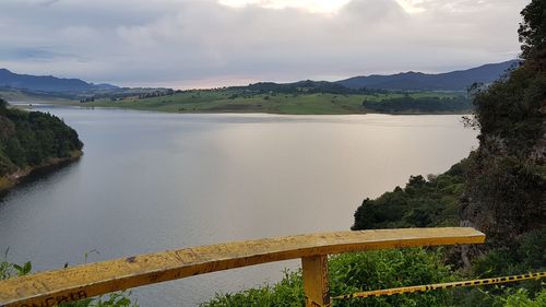 High angle view of river against cloudy sky