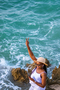 Rear view of woman looking at sea