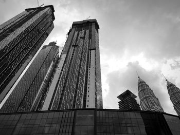 Low angle view of modern buildings against sky