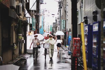 People walking on city street