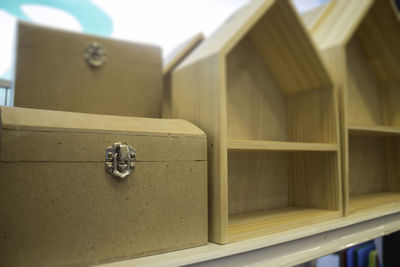 Close-up of wooden containers on table