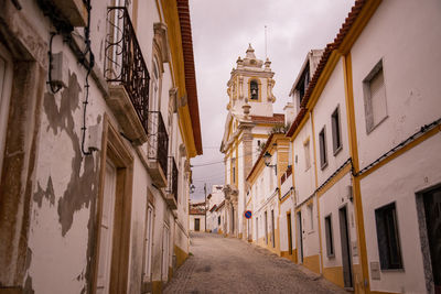 Street amidst buildings in city