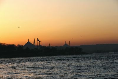 Scenic view of sea at sunset