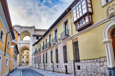 Low angle view of buildings against sky in city