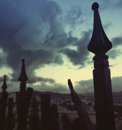 Low angle view of building against cloudy sky