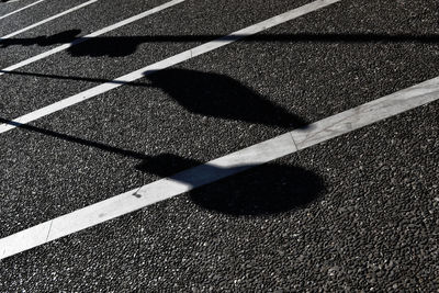 Full frame shot of road with shadow