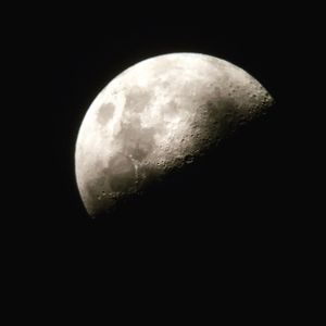 Close-up of moon against clear sky at night