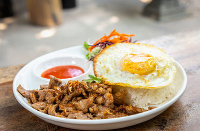 Close-up of breakfast served on table