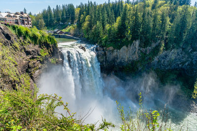 A view of snoqualmie falls on a powerful day in washington state.