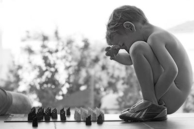 Close-up of boy with chess