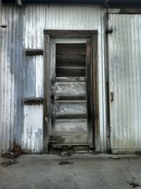 Closed wooden door of house