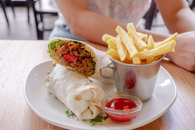 Vegan wrap and french fries