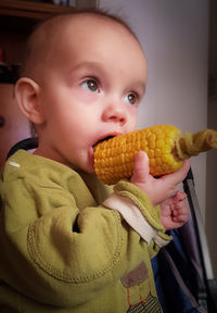 Portrait of cute girl eating food