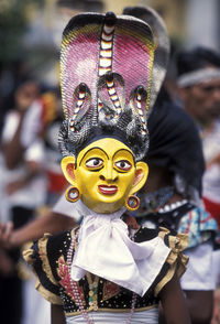 Person in mask during traditional festival