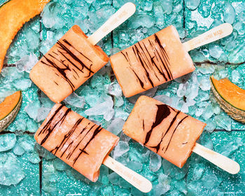 High angle view of ice cream on wood