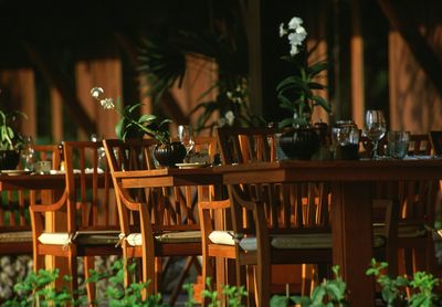 Empty chairs and tables in restaurant