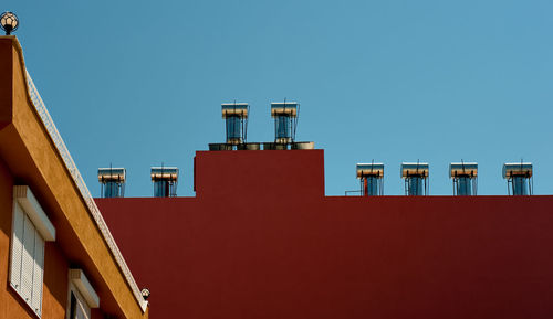 Low angle view of built structure against blue sky
