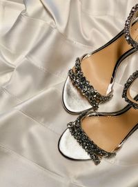 High angle view of necklace on bed