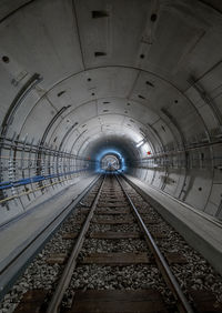 Railroad tracks in tunnel