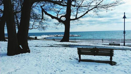 Empty bench on beach