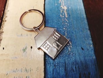 High angle view of model home key ring on table