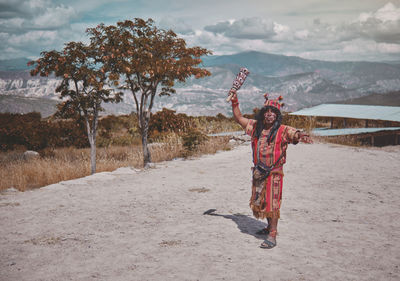 Representation of inca warrior dressed and with battle weapons, prehispanic warrior fighting in peru