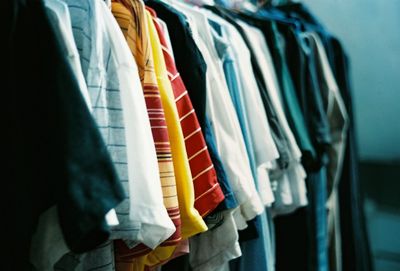 Close-up of clothes in row for sale at store