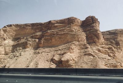 Scenic view of rock formation against clear sky