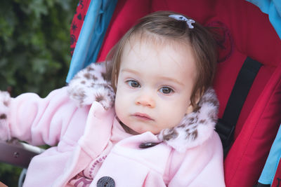 Portrait of cute baby girl outdoors