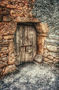 Closed wooden door of old building