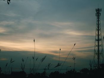 Silhouette plants against sky during sunset
