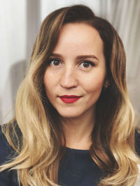 Close-up portrait of a smiling young woman