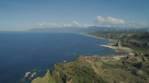 Aerial view of windmills for electric power production on the coast. bangui windmills 