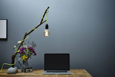 Information sign in vase on table