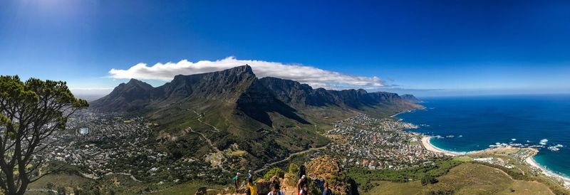Scenic view of mountain against blue sky