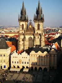 Cathedral in city against clear sky