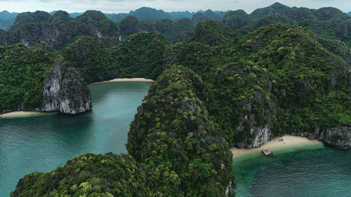 High angle view of sea against mountain