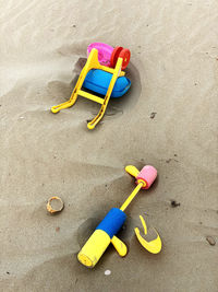 High angle view of toy on sand